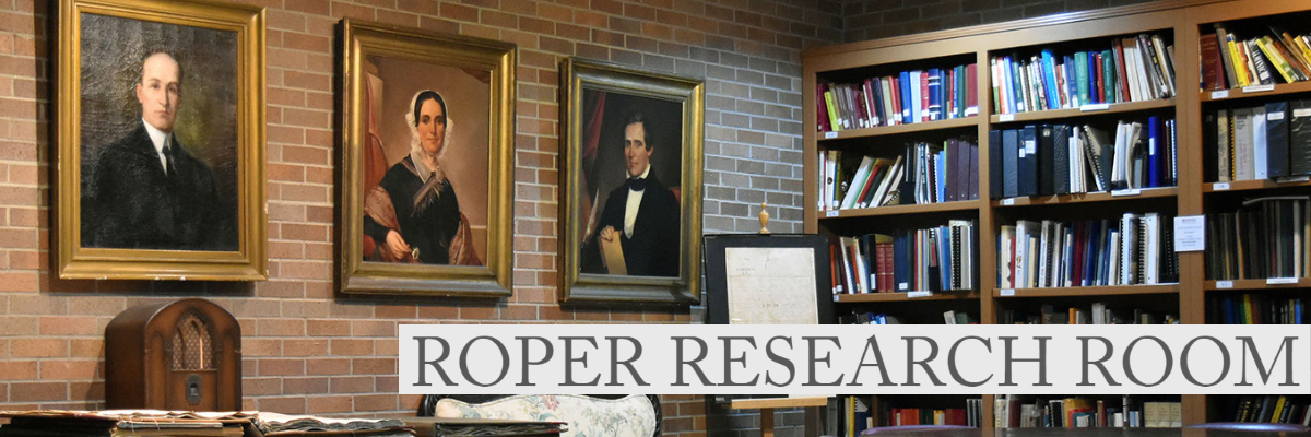 portrait wall in the Roper research room